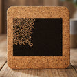 Wyoming square cork coaster engraved with the state shape in ornate floral scrollwork