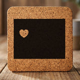 Wyoming square cork coaster engraved with the state shape and a heart