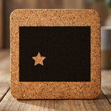 Wyoming square cork coaster engraved with the state shape and a star