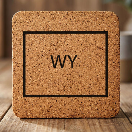 Wyoming square cork coaster engraved with the state outline and WY initials