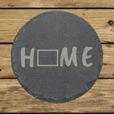 Wyoming round slate coaster engraved with HOME using the state outline as the letter O