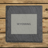 Wyoming square slate coaster engraved with the state shape and WYOMING in bold lettering